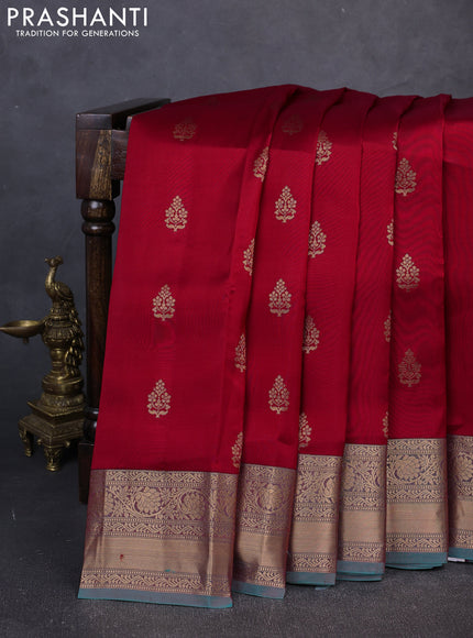 Kanchipuram silk saree maroon and dual shade of teal green with allover zari woven buttas and long zari woven border