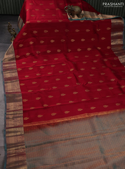 Kanchipuram silk saree maroon and dual shade of teal green with allover zari woven buttas and long zari woven border