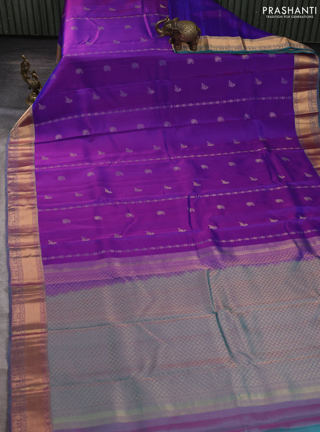 Kanchipuram silk saree purple and dual shade of teal green with allover zari woven buttas and rich zari woven border