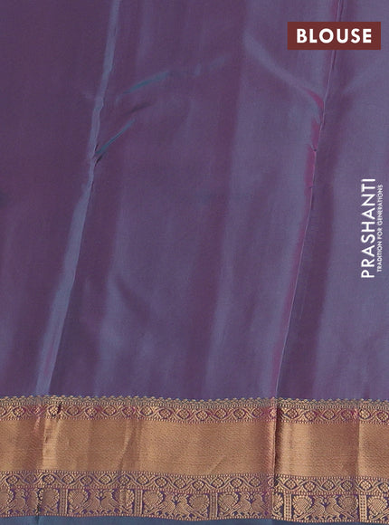Kanchipuram silk saree purple and dual shade of teal green with allover zari woven buttas and rich zari woven border