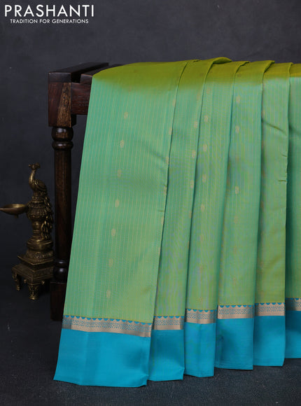 Kanchipuram silk saree teal green and teal blue with allover zari woven stripes & buttas and zari woven simple border