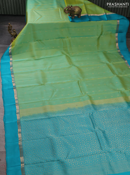 Kanchipuram silk saree teal green and teal blue with allover zari woven stripes & buttas and zari woven simple border