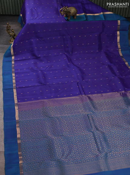 Kanchipuram silk saree royal blue and peacock blue with allover zari woven stripes & buttas and zari woven simple border