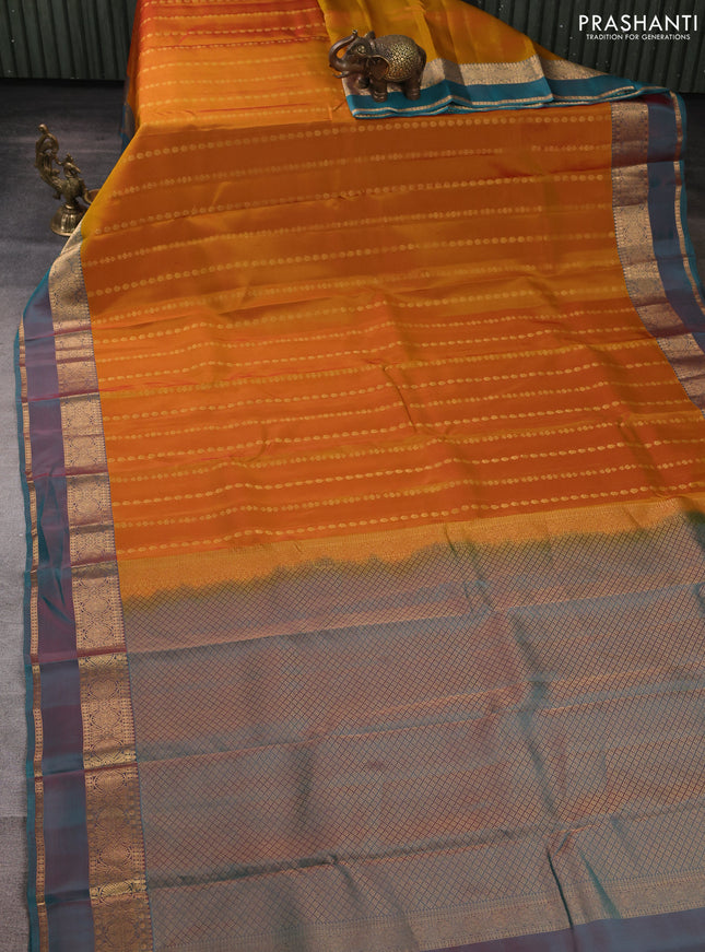 Kanchipuram silk saree mustard yellow and peacock green with allover zari woven buttas and zari woven simple border