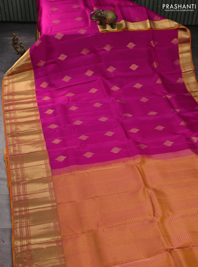 Kanchipuram silk saree pink and mustard yellow with allover zari woven buttas and long rich zari woven border