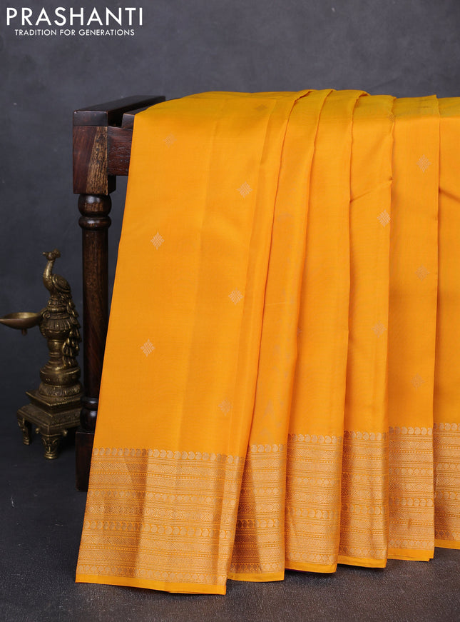 Kanchipuram silk saree yellow and purple with zari woven buttas and long zari woven border