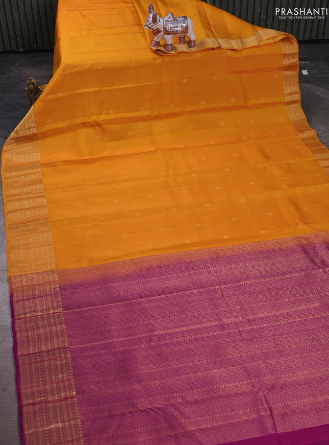 Kanchipuram silk saree yellow and purple with zari woven buttas and long zari woven border