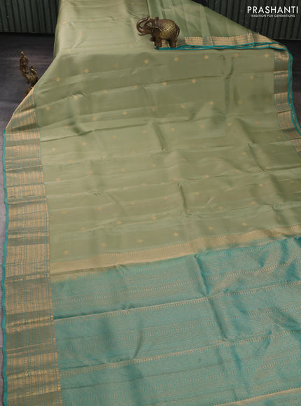 Kanchipuram silk saree pastel green and teal green with zari woven buttas and long zari woven border