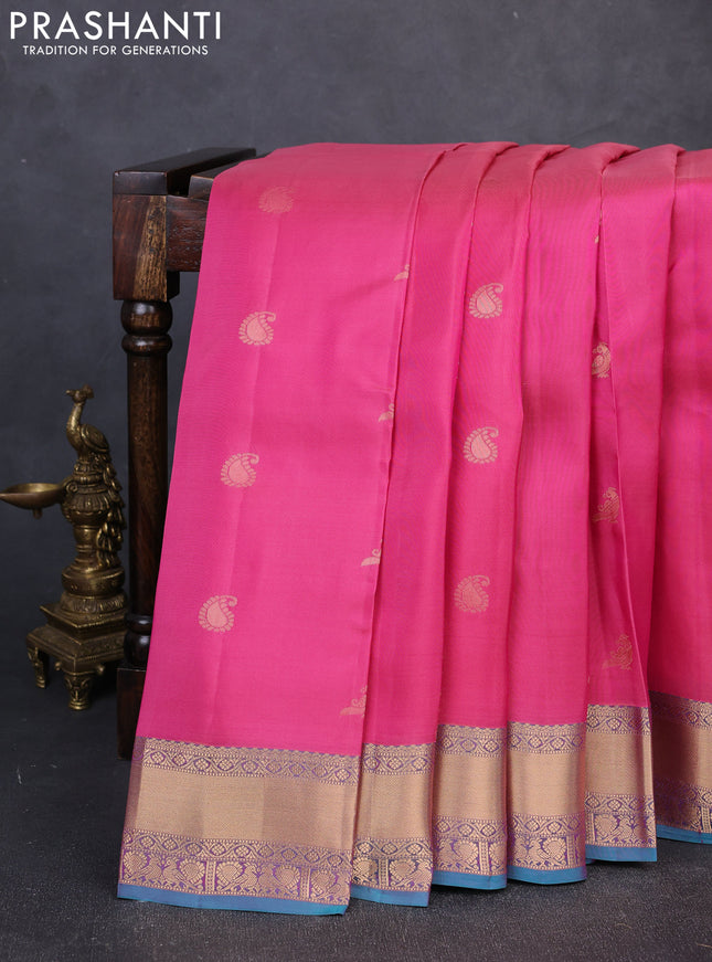Kanchipuram silk saree pink and peacock green with allover zari stripes & buttas and rich zari woven border