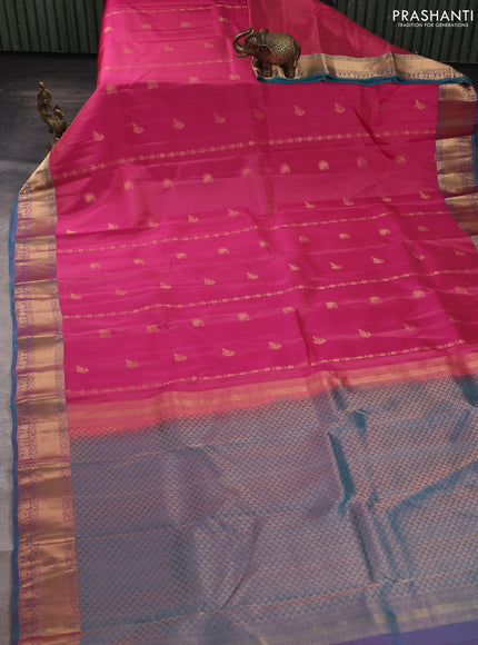 Kanchipuram silk saree pink and peacock green with allover zari stripes & buttas and rich zari woven border