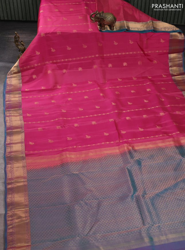 Kanchipuram silk saree pink and peacock green with allover zari stripes & buttas and rich zari woven border
