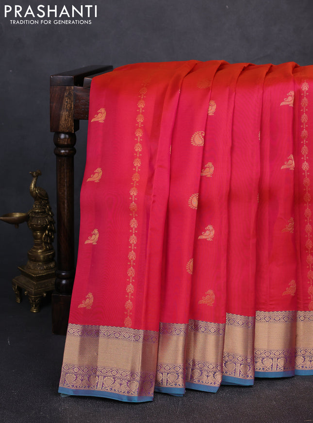 Kanchipuram silk saree red and peacock green with allover zari stripes & buttas and rich zari woven border