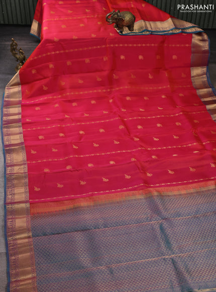 Kanchipuram silk saree red and peacock green with allover zari stripes & buttas and rich zari woven border