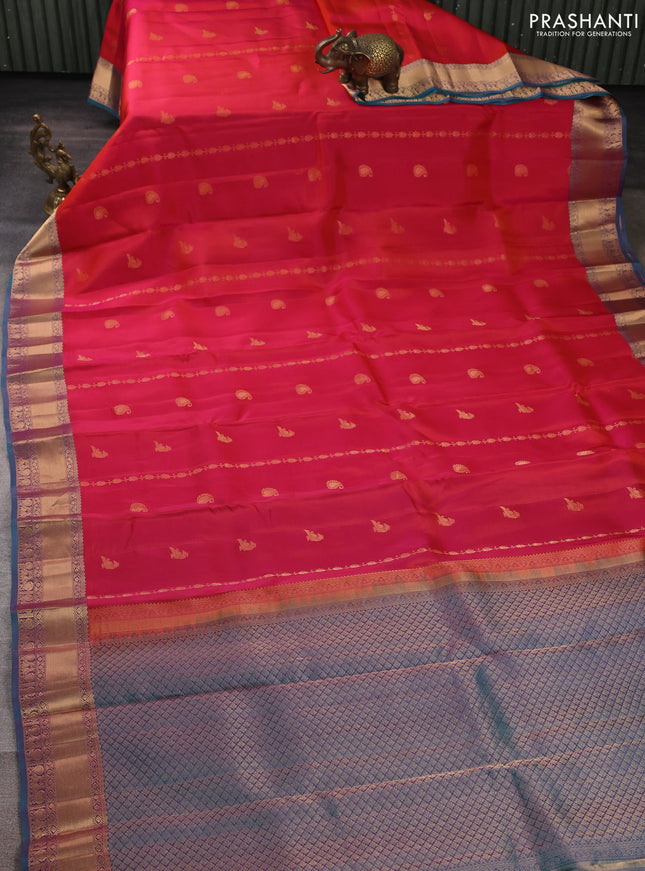 Kanchipuram silk saree red and peacock green with allover zari stripes & buttas and rich zari woven border