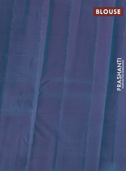 Kanchipuram silk saree teal green and dual shade of purple with allover zari woven buttas and long zari woven border