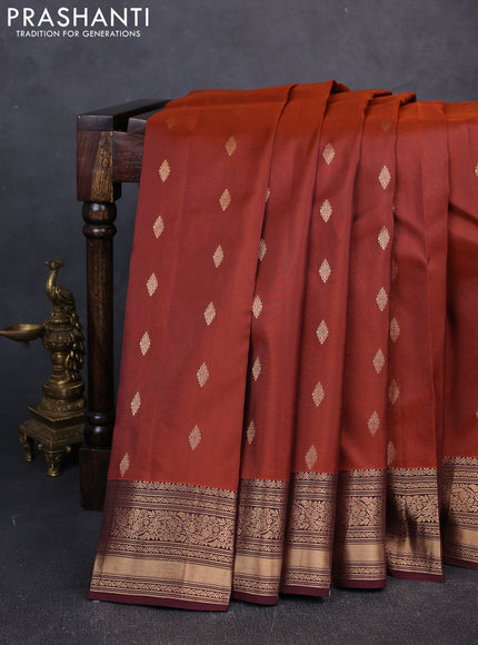 Kanchipuram silk saree rust and coffee brown with allover zari woven buttas and zari woven border