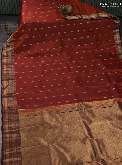 Kanchipuram silk saree rust and coffee brown with allover zari woven buttas and zari woven border