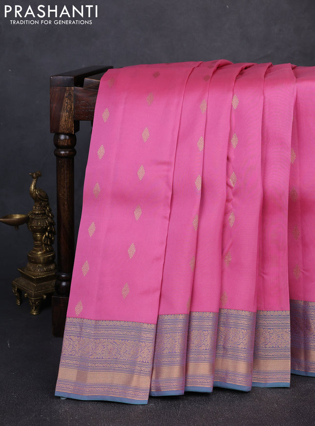 Kanchipuram silk saree light pink and dual shade of teal green with allover zari woven buttas and zari woven border