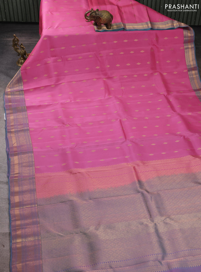 Kanchipuram silk saree light pink and dual shade of teal green with allover zari woven buttas and zari woven border