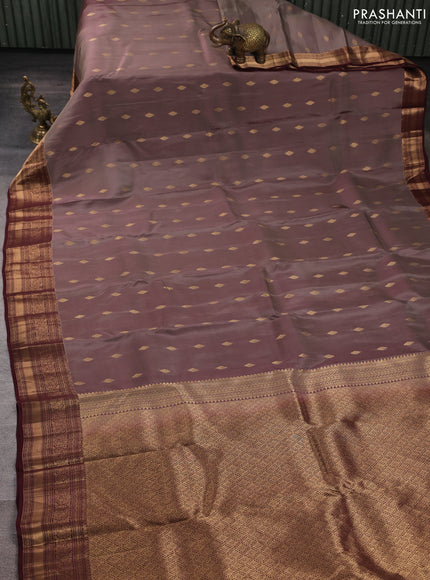 Kanchipuram silk saree brown shade and deep maroon with allover zari woven buttas and zari woven border