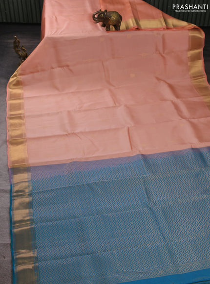 Kanchipuram silk saree peach and peacock green with allover vairosi pattern & zari buttas and rich zari woven border