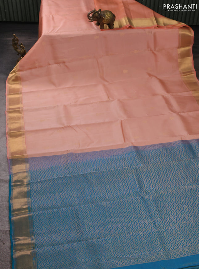 Kanchipuram silk saree peach and peacock green with allover vairosi pattern & zari buttas and rich zari woven border