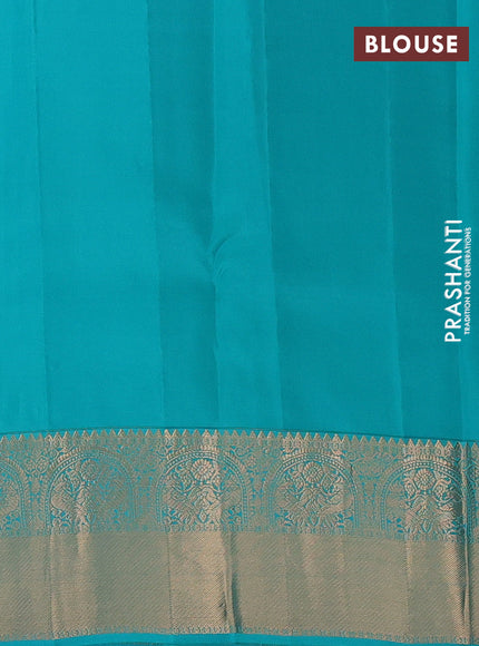 Kanchipuram silk saree sunset orange and teal green with zari woven buttas and rich zari woven border