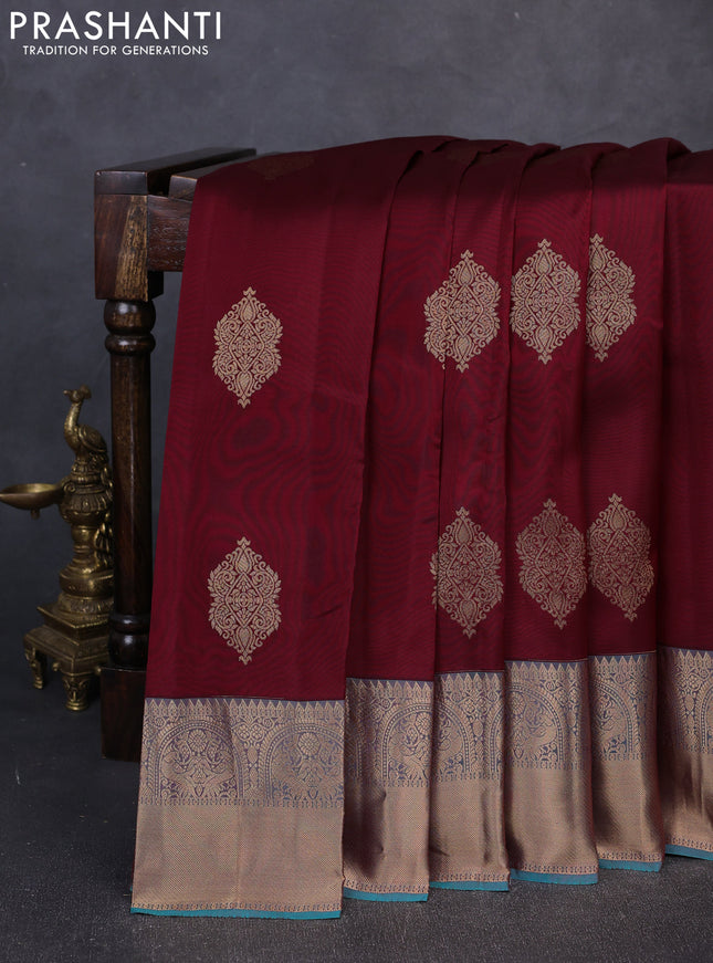 Kanchipuram silk saree deep maroon and dual shade of teal green with zari woven buttas and long rich zari woven border