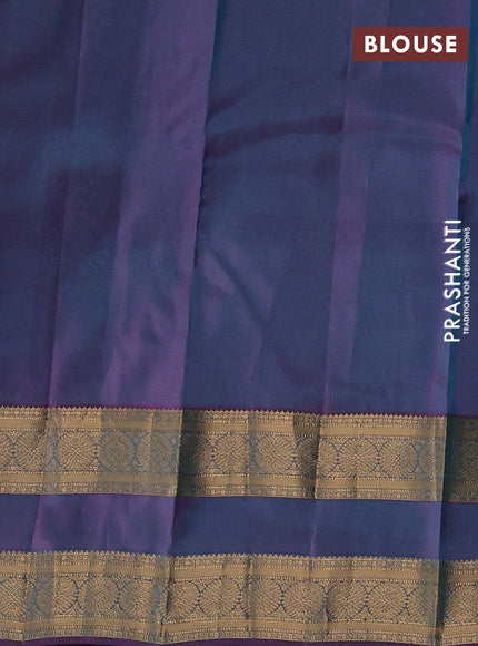 Kanchipuram silk saree teal blue and dual shade of purple with allover zari woven buttas and rettapet zari woven border