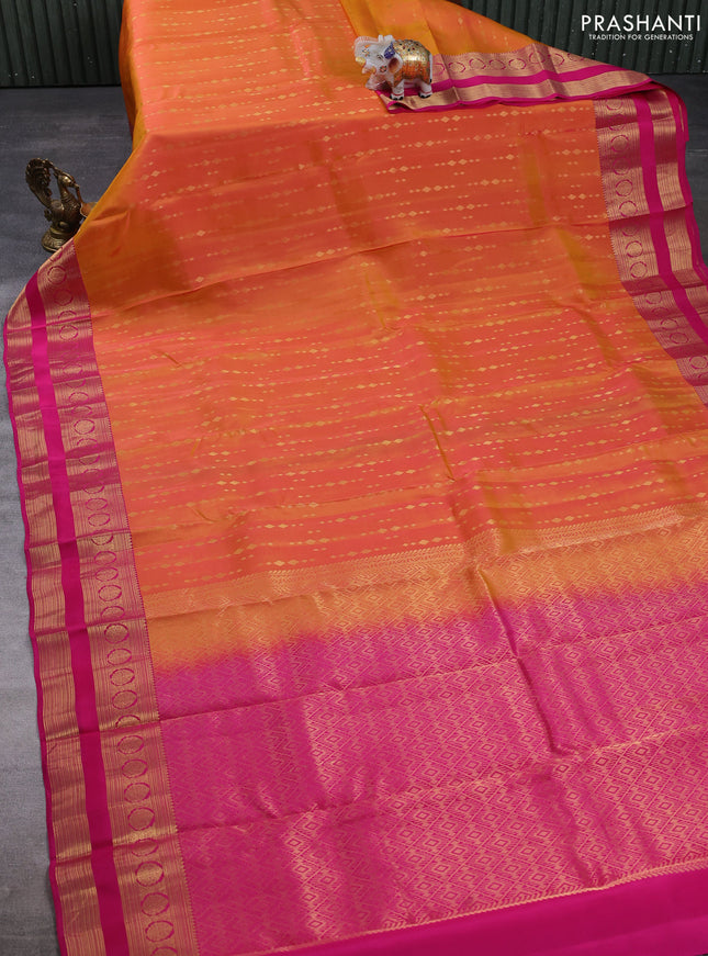 Kanchipuram silk saree sunset orange and pink with allover zari woven geometric buttas and rettapet zari woven border