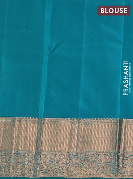 Kanchipuram silk saree dual shade of teal green and teal blue with allover zari woven buttas and long zari woven border