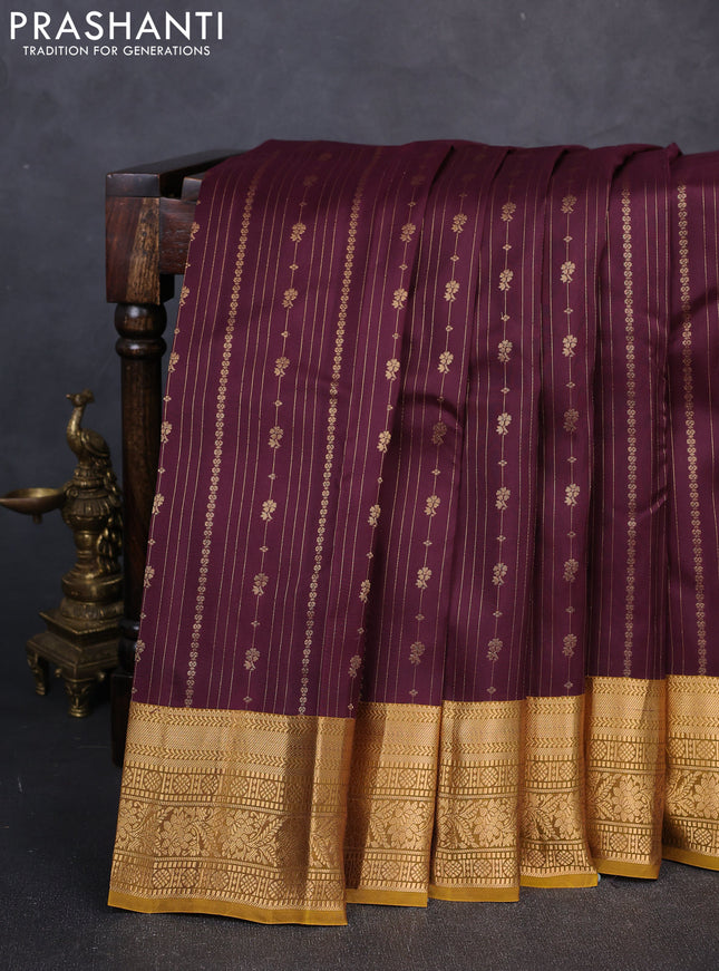 Kanchipuram silk saree deep wine and mustard green with allover zari stripe pattern and long zari woven border