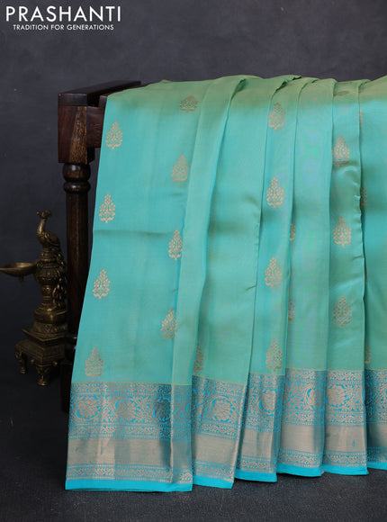 Kanchipuram silk saree teal green and teal blue with allover zari woven buttas and long zari woven border