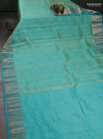 Kanchipuram silk saree teal green and teal blue with allover zari woven buttas and long zari woven border