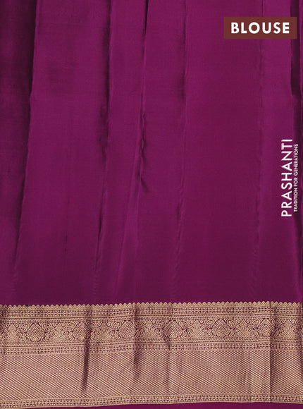Kanchipuram silk saree green and magenta pink with paisley zari woven buttas and zari woven border