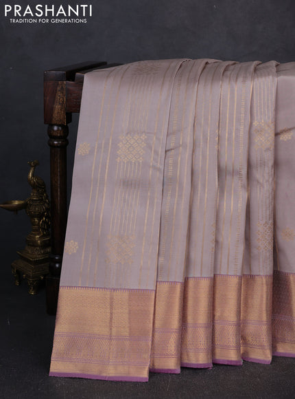 Kanchipuram silk saree beige and dual shade of purple with allover zari weaves & buttas and long zari woven border