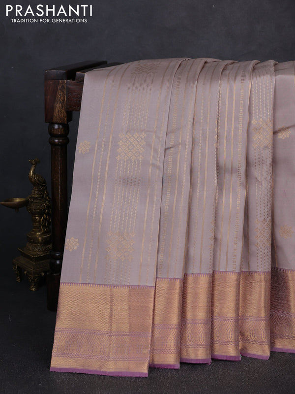 Kanchipuram silk saree beige and dual shade of purple with allover zari weaves & buttas and long zari woven border