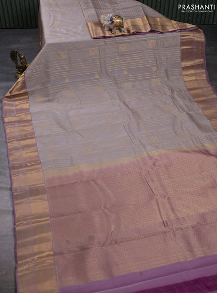Kanchipuram silk saree beige and dual shade of purple with allover zari weaves & buttas and long zari woven border