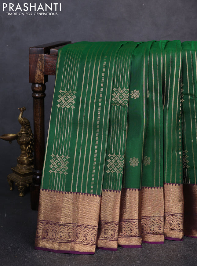 Kanchipuram silk saree green and purple with allover zari weaves & buttas and long zari woven border