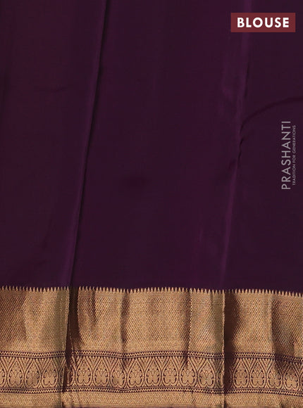 Kanchipuram silk saree green and purple with allover zari weaves & buttas and long zari woven border