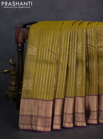Kanchipuram silk saree mehendi green and deep purple with allover zari weaves & buttas and long zari woven border