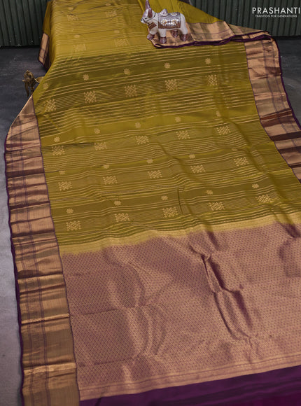 Kanchipuram silk saree mehendi green and deep purple with allover zari weaves & buttas and long zari woven border