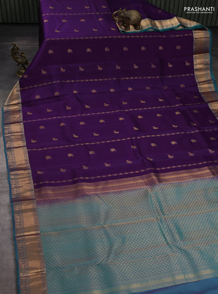Kanchipuram silk saree purple and teal green with allover zari woven buttas and rich zari woven border