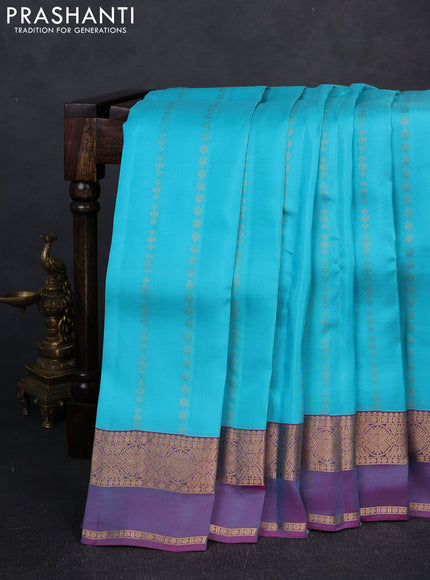Kanchipuram silk saree teal blue and dual shade of purple with allover zari woven buttas and zari woven simple border