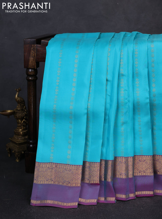 Kanchipuram silk saree teal blue and dual shade of purple with allover zari woven buttas and zari woven simple border