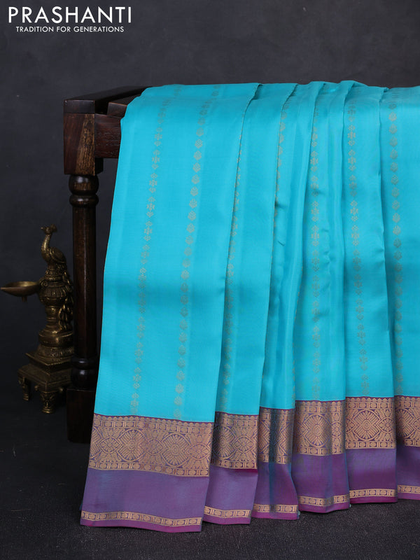Kanchipuram silk saree teal blue and dual shade of purple with allover zari woven buttas and zari woven simple border