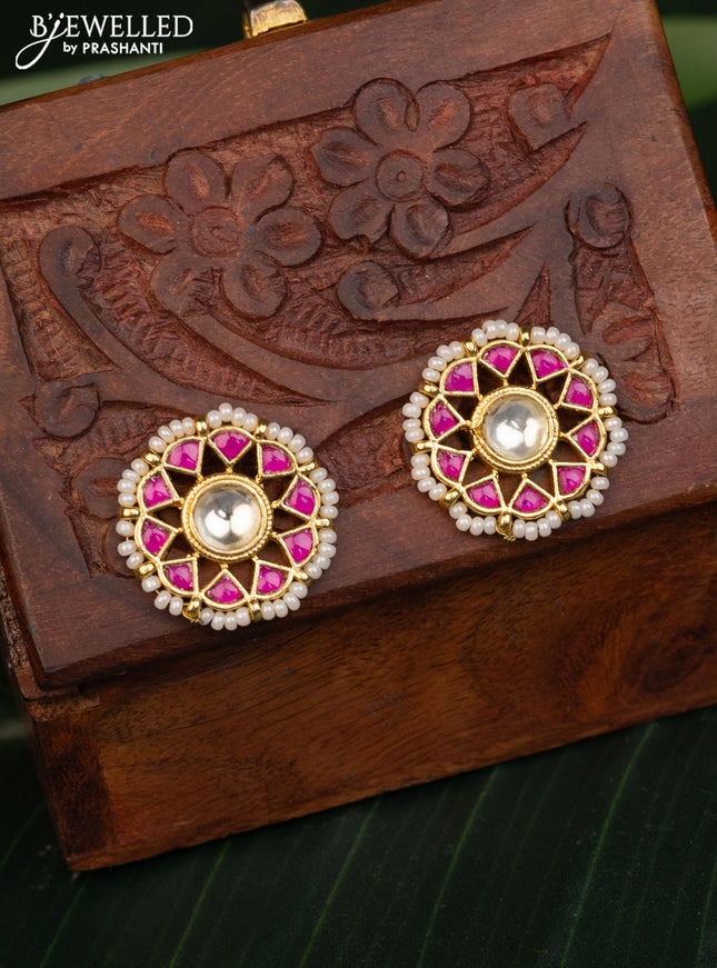 Antique earrings with pink pachi kundan stones and pearls