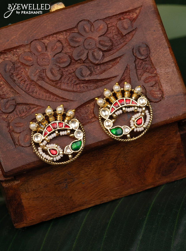 Antique earrings with pink pachi kundan stones and pearls