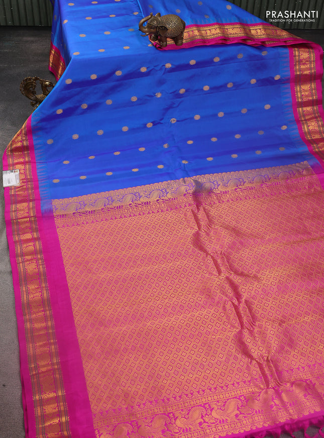 Pure gadwal silk saree blue and pink with zari woven buttas and temple design zari woven border