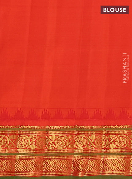 Pure gadwal silk saree navy blue and orange with allover zari checks & buttas and temple design zari woven border